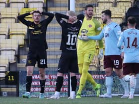 Hearts' Craig Gordon celebrates his triple save.