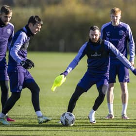 Hibs' Dylan Vente, Dylan Levitt and Boyle during a training session on Friday.