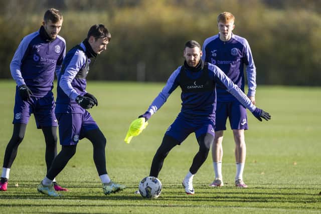 Hibs' Dylan Vente, Dylan Levitt and Boyle during a training session on Friday.