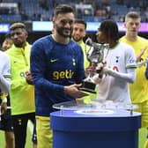 Tottenham's Hugo Lloris (L) is presented with the Walter Tull trophy by Jermain Defoe at full time. (Photo by Rob Casey / SNS Group)