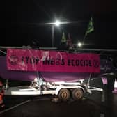 Extinction Rebellion Scotland activists lock themselves to boats used to block access to Ineos at Grangemouth picture: Extinction Rebellion