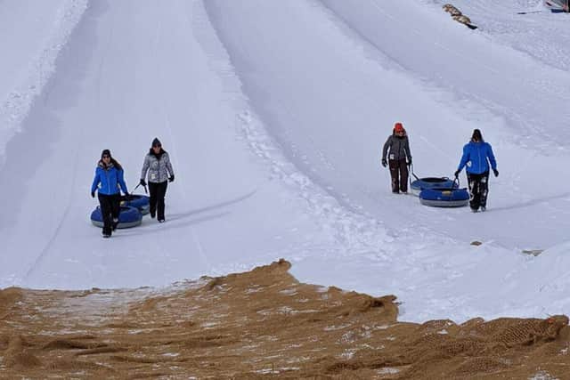 Snow tubing in Alberta.
