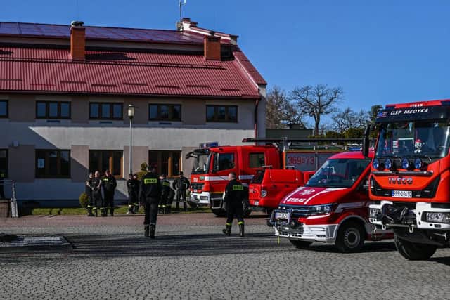 Fire engines parked in front of a sports hall selected to operate as a refugee center in case of a huge influx of refugees from Ukraine on February 24, 2022 in Medyka, Poland. Overnight, Russia began a large-scale attack on Ukraine, with explosions reported in multiple cities and far outside the restive eastern regions held by Russian-backed rebels.