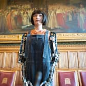 Ai-Da Robot poses for pictures in the Houses of Parliament