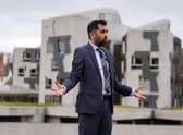 Health Secretary Humza Yousaf speaks to the media outside the Scottish Parliament. Andrew Milligan/PA Wire