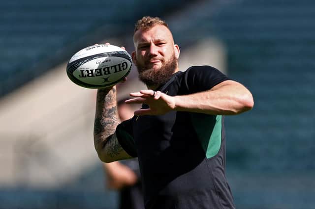 South Africa's lock RG Snyman listens to The Hu as part of his pre-match preparations.