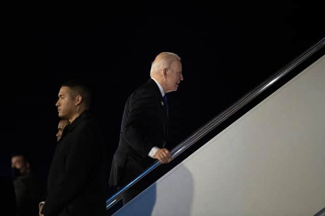 US President Joe Biden boards Air Force One at Edinburgh Airport on Tuesday after attending the COP26 climate summit in Glasgow (Picture: Brendan Smialowski/AFP via Getty Images)