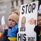 Ukrainians hold a protest against the Russian invasion of Ukraine outside Downing Street. Picture: Stefan Rousseau/PA Wire