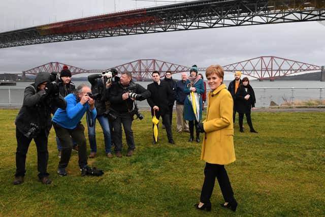 Then First Minister Nicola Sturgeon poses in front of the Queensferry Crossing, a project greenlit by predecessor Alex Salmond (Picture: Andy Buchanan/AFP via Getty Images)