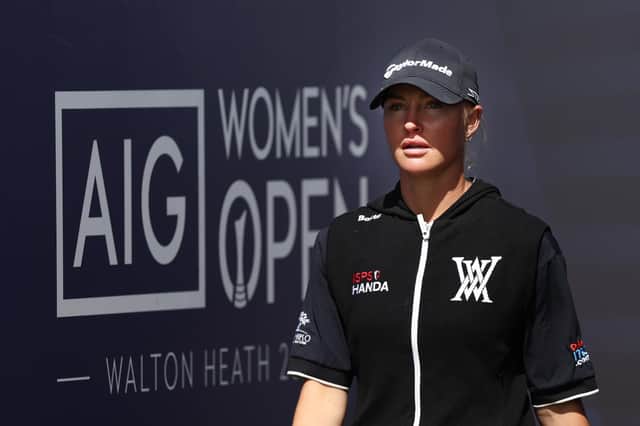Charley Hull walks to the first tee on the final day of the AIG Women's Open at Walton Heath in Tadworth. Picture: Oisin Keniry/R&A/R&A via Getty Images.