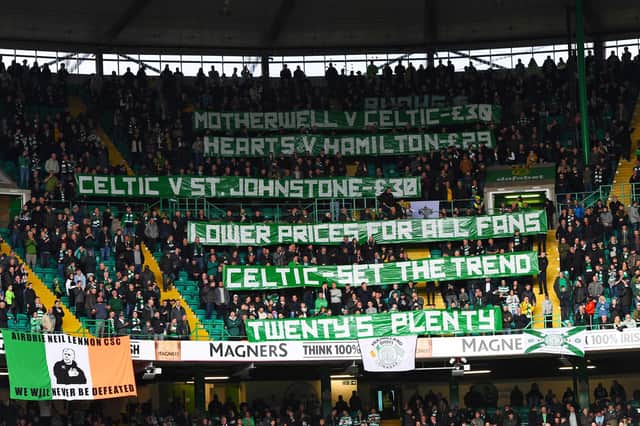 Celtic fans protest over the cost of watching football in Scotland during a game against Ross County last year.