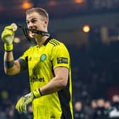 Celtic goalkeeper Joe Hart shows off his winner's medal after the Premier Sports Cup victory over Hibs.