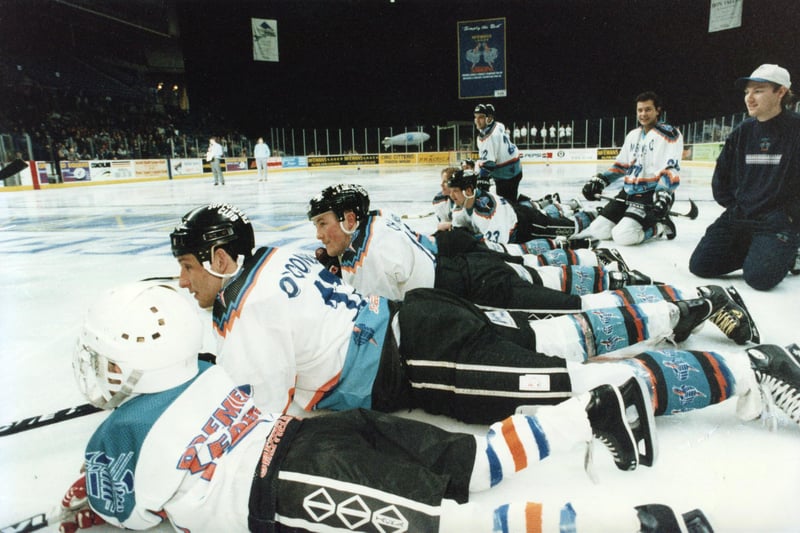 Players lying down on the ice - February 27 1996