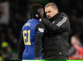 Celtic manager Ange Postecoglou and Hearts' Garang Kuol at full time following a recent match at Parkhead.  (Photo by Craig Williamson / SNS Group)