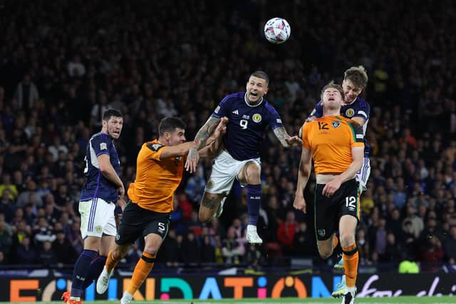 Scotland's Lyndon Dykes heads at goal during a Uefa Nations League match against the Republic of Ireland (Picture: Ian MacNicol/Getty Images)
