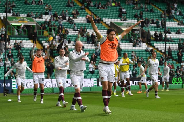 Hearts players warming up before facing Celtic at Celtic Park. (Photo by Craig Foy / SNS Group)