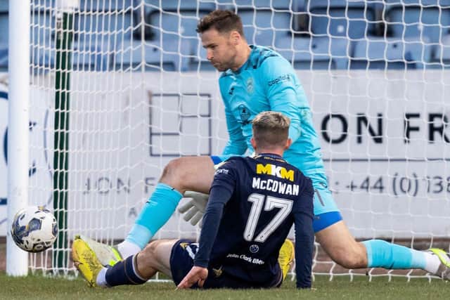 Hibs keeper David Marshall made a number of big saves from Dundee's impressive forward Luke McCowan.