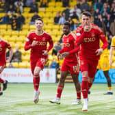 Aberdeen's Bojan Miovski celebrates scoring a late winner at Livingston before it was ruled offside by VAR. (Photo by Sammy Turner / SNS Group)