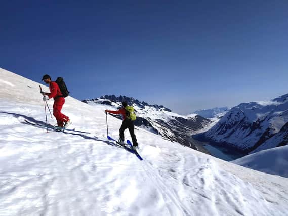 Ski touring involves walking on skis up slopes rather than using a gondola. Pic: Luc Smith/PA.