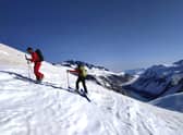 Ski touring involves walking on skis up slopes rather than using a gondola. Pic: Luc Smith/PA.