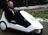 Sir Clive Sinclair demonstrates his C5 electric vehicle, in 1985