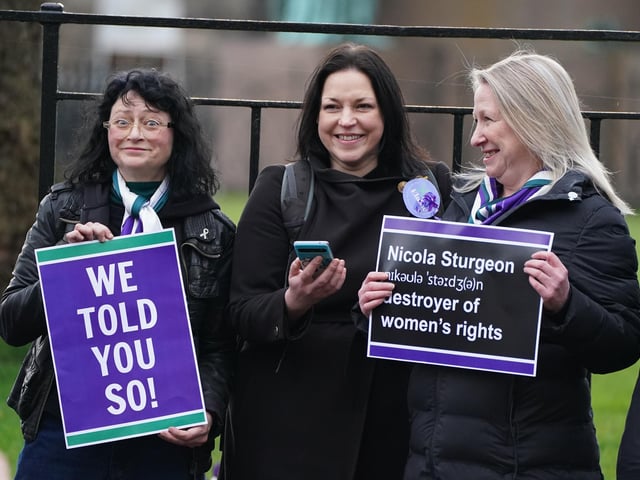 Members of the public outside Bute House in Edinburgh during a press conference