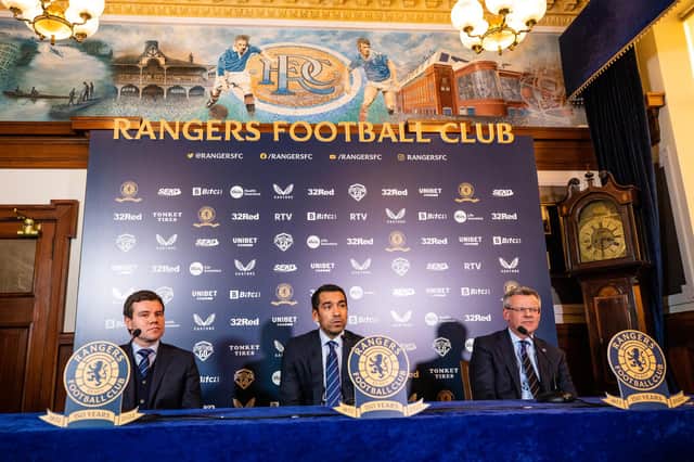 New Rangers manager Giovanni van Bronckhorst speaks to the media in the Blue Room at Ibrox alongside Sporting Director Ross Wilson (L) and Managing Director Stewart Robertson (R). (Photo by Kirk O'Rourke)