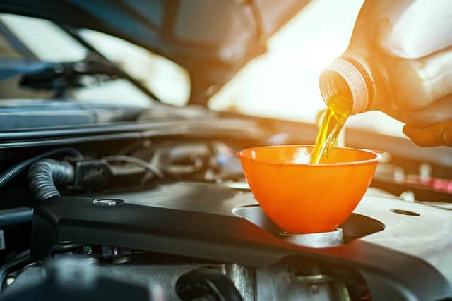 Making sure oil and coolant are topped up will keep your car running smoothly whatever the weather