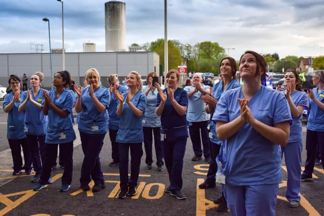 NHS staff at Glasgow's Queen Elizabeth University Hospital participate in the Clap for Carers and key workers. Picture: Jeff J Mitchell/Getty Images