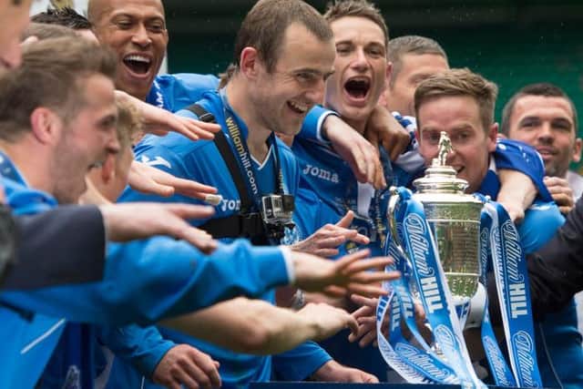 The St Johnstone players celebrate with the Scottish Cup in 2014. Picture: SNS