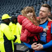 Inverness striker Billy McKay with his daughter at full-time after the Scottish Cup semi-final win over Falkirk. (Photo by Craig Williamson / SNS Group)