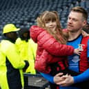 Inverness striker Billy McKay with his daughter at full-time after the Scottish Cup semi-final win over Falkirk. (Photo by Craig Williamson / SNS Group)