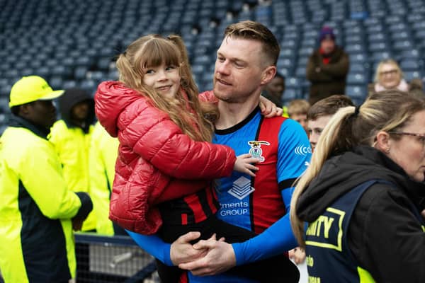 Inverness striker Billy McKay with his daughter at full-time after the Scottish Cup semi-final win over Falkirk. (Photo by Craig Williamson / SNS Group)