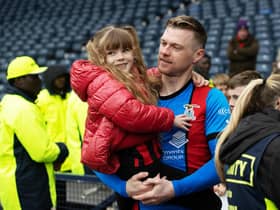 Inverness striker Billy McKay with his daughter at full-time after the Scottish Cup semi-final win over Falkirk. (Photo by Craig Williamson / SNS Group)
