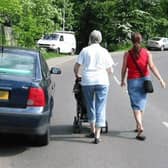 Vehicles blocking pavements put pedestrians at risk by forcing them onto roads