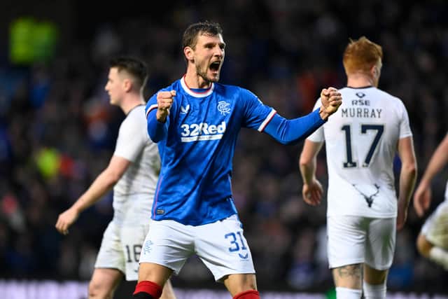 Rangers left-back Borna Barisic celebrates after his deflected free-kick sealed a 2-1 victory over Ross County at Ibrox. (Photo by Rob Casey / SNS Group)