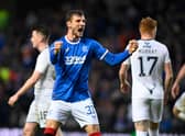 Rangers left-back Borna Barisic celebrates after his deflected free-kick sealed a 2-1 victory over Ross County at Ibrox. (Photo by Rob Casey / SNS Group)