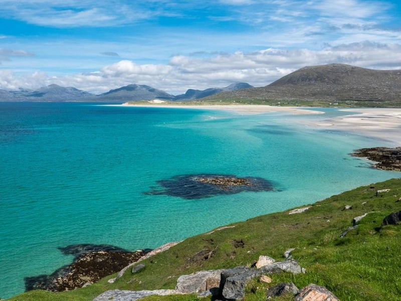 Luskentyre Bay is located on the west coast of South Harris in the Outer Hebrides. Famed for its incredible beaches, in reality a substantial amount of the coastline is rocky, however the vast dunes are still well worth the visit.