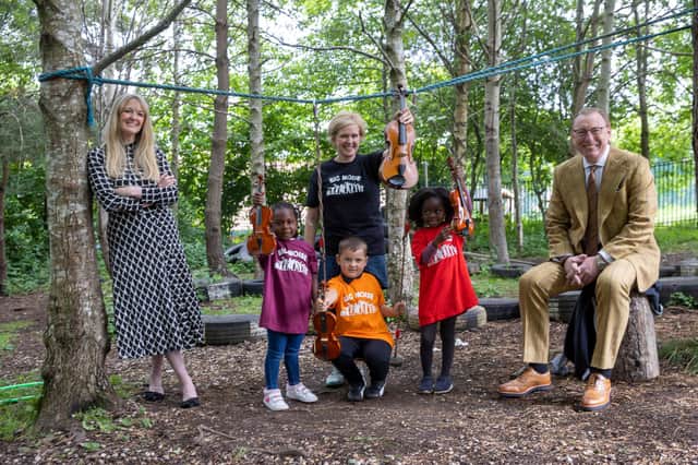 Sistema Scotland chief executive Nicola Killean, Rachel Odutona, Big Noise musician Elizabeth McColl, Jaxson Davidson, Alice Ajayi and Benny Higgins, chairman of Sistema Scotland. Picture: Jeff Holmes