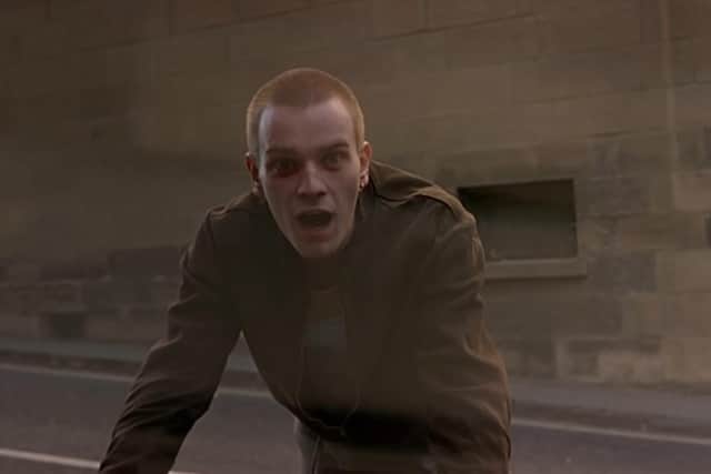 Ewan McGregor as Renton in a memorable scene filmed on Calton Road in Edinburgh.