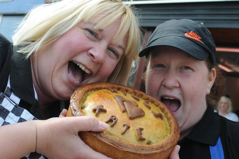 Nichola Hewitt and Sadie McNicholas with giant pork pie at Morrells in York Road 10 years ago but who can tell us more?