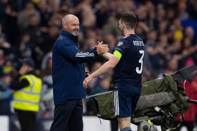 A handshake for skipper Andy Robertson from head coach Steve Clarke after the win over Israel. (Photo by Craig Foy / SNS Group)