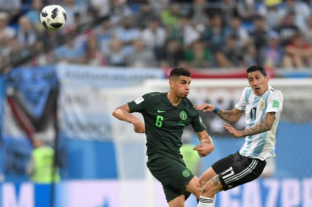 Rangers defender Leon Balogun in action for Nigeria against Argentina's Angel Di Maria at the 2018 World Cup Finals in Russia. (Photo by GABRIEL BOUYS/AFP via Getty Images)