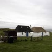 General view of a thatched cottage on the coast on the isle of Tiree off the west coast of Scotland (pic: Andrew Milligan)