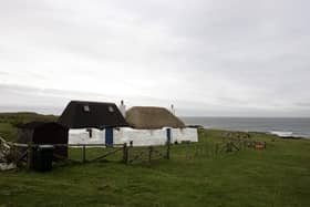 General view of a thatched cottage on the coast on the isle of Tiree off the west coast of Scotland (pic: Andrew Milligan)