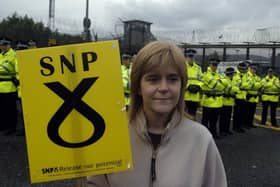 Nicola Sturgeon, in her younger days, attends an anti-nuclear protest at Faslane nuclear submarine base on the Clyde (Picture: Andrew Milligan/PA)