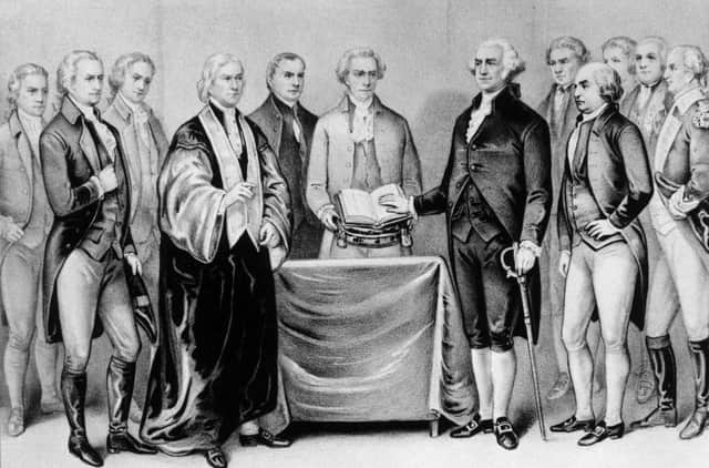 The inauguration of George Washington as the first President of the United States, also present are (from left) Alexander Hamilton, Robert R Livingston, Roger Sherman, Mr Otis, Vice President John Adams, Baron Von Steuben and General Henry Knox. (Picture: Original artwork printed by Currier & Ives/MPI/Getty Images)