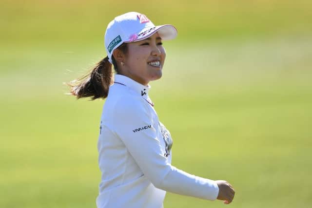 Ayaka Furue of Japan smiles at the 18th hole during the final round of the Trust Golf Women's Scottish Open at Dundonald Links. Picture: Mark Runnacles/Getty Images.