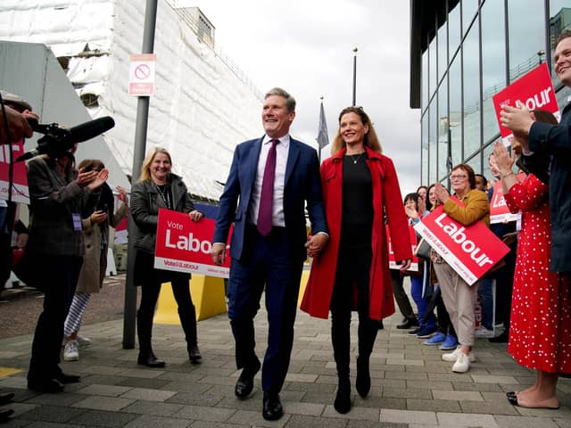 Labour party leader Sir Keir Starmer and his wife Victoria, are greeted by party supporters as they arrive at the Pullman Liverpool, ahead of the start of the Labour Party Conference in Liverpool. Picture date: Saturday September 24, 2022.