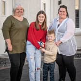 Osprey Housing Officer Elaine Sutherland (left) with new Inchmarlo residents Teresa Cruickshank, her daughter Millie, 10, and five-year-old son William.